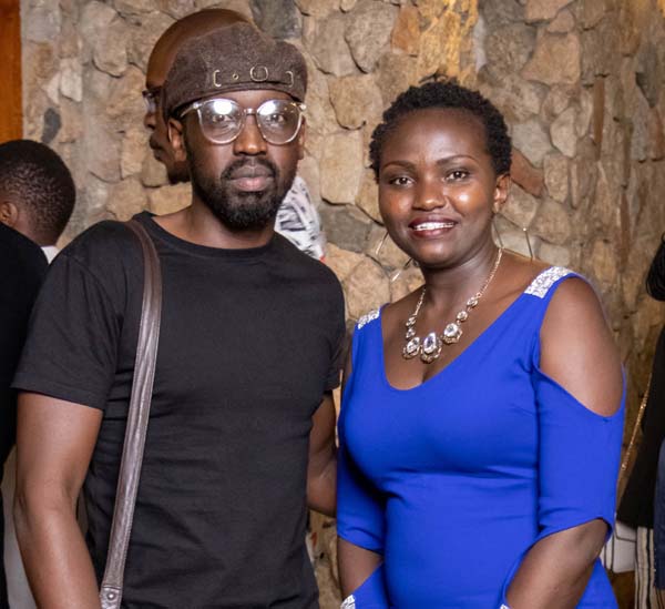 Spoken Word Poet Mufasa with Qazini writer Mourine Odongo.